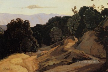 Camino a través de montañas boscosas plein air Romanticismo Jean Baptiste Camille Corot Pinturas al óleo